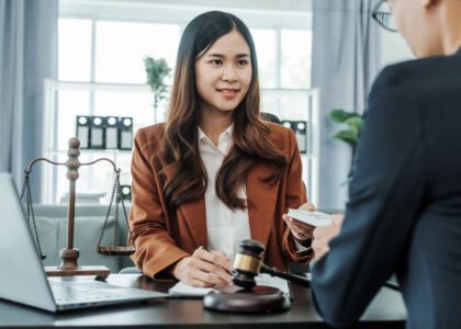 Female lawyer consulting client in office